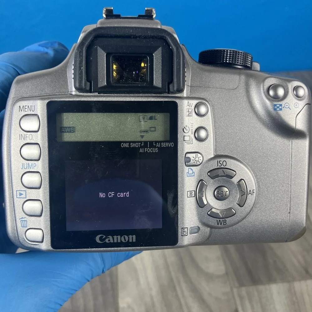 Canon EOS Digital Rebel DSLR Camera w/ EF-S 18-55mm Lens, Battery, Charger & Bag